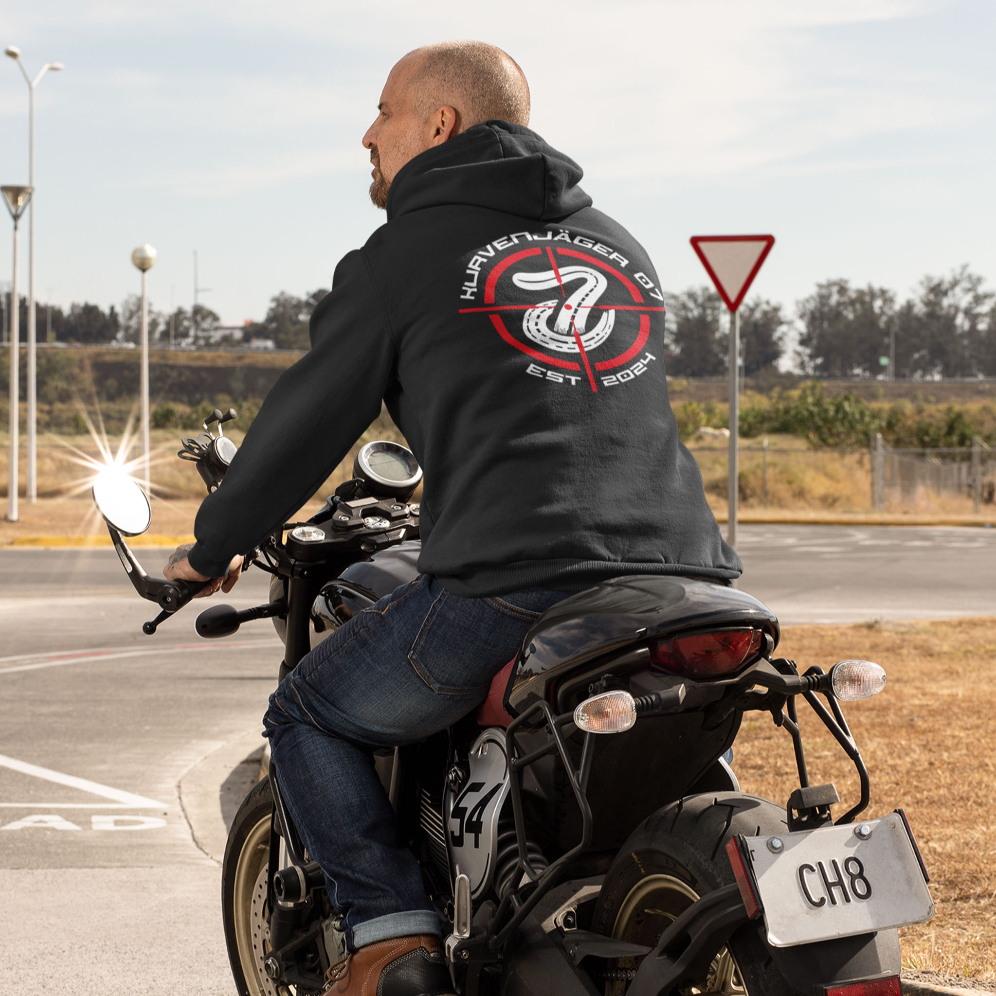 20260617 back view hoodie mockup featuring a biker on the road 31846 928cb963 d25e 4a6b 9220 4b4a991a9f5b