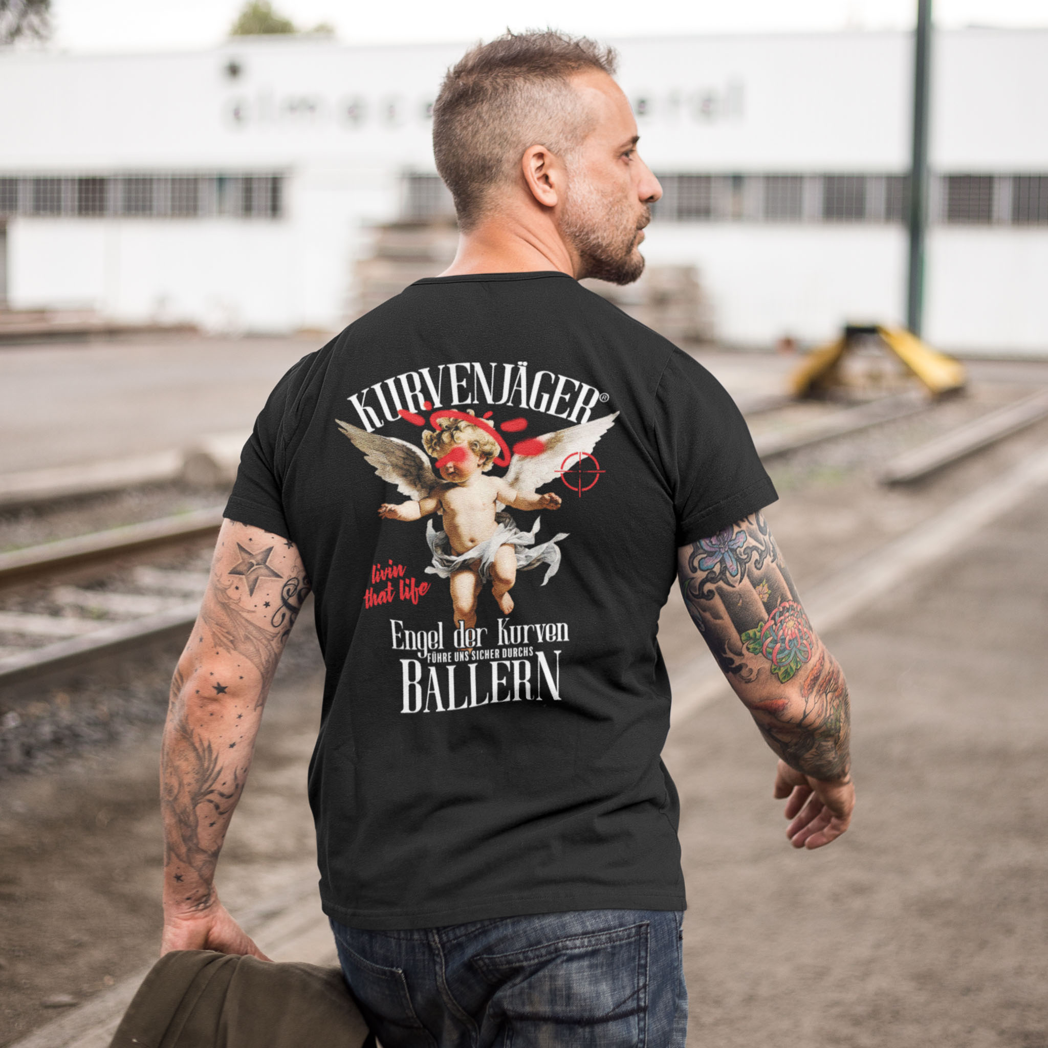 20260617 mockup of the back of a middle aged man wearing a round neck tee at a construction site a9371b 2b358352 d951 485b 977a d651cdbffaa0